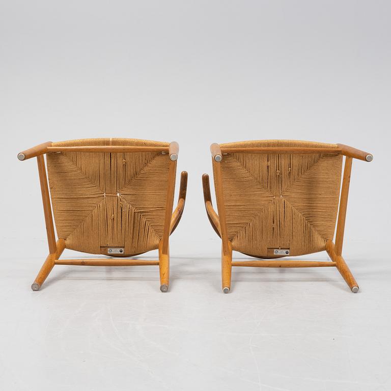 A pair of oak 'Y-chairs' by Hans J Wegner for Carl Hansen & Son, designed 1949.