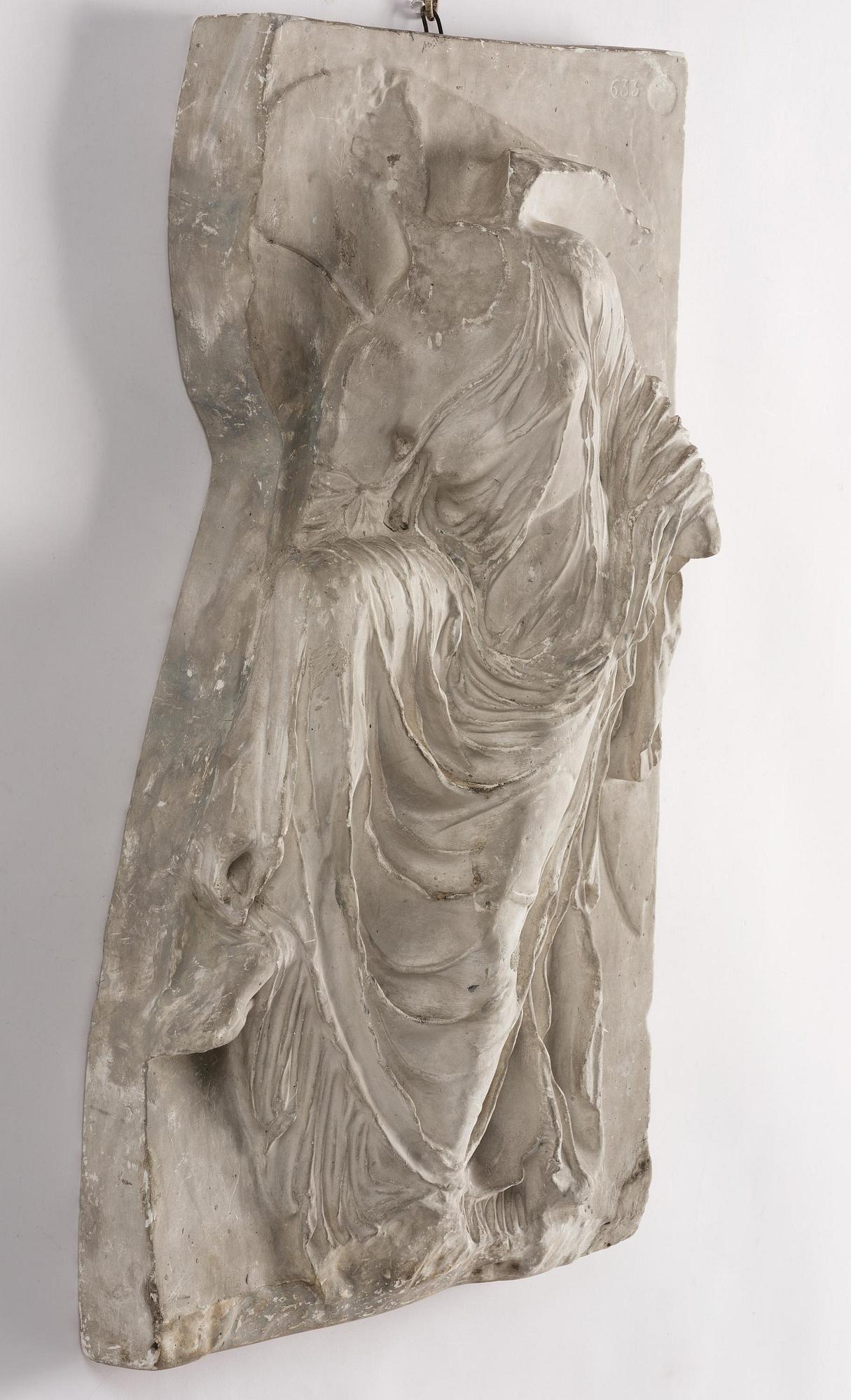 A presumably French 19th century plaster cast of the Nike of the Sandal.