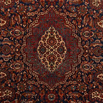 A semi-antique Isfahan rug, central Persia, c. 305 x 205 cm.