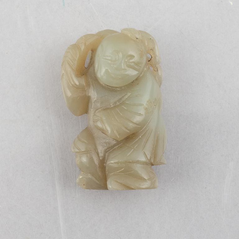 A group of four Chinese stone charms, 20th century.