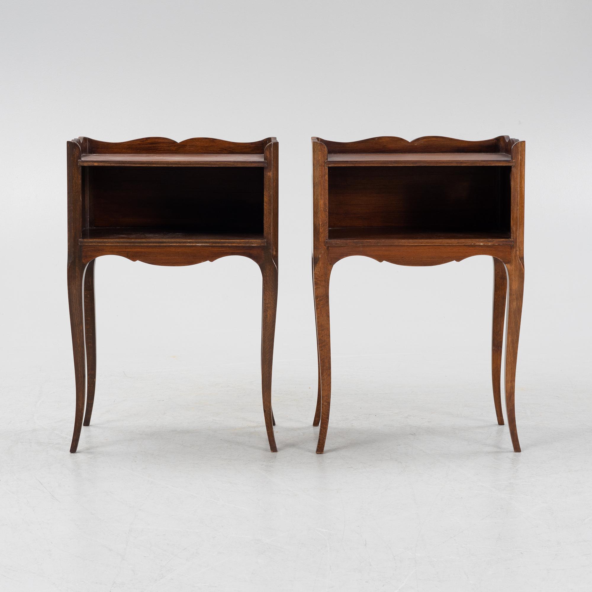 A pair of rococo style bedside tables, mid 20th Century.