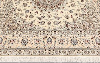 A Nain carpet, part silk, so called 6LAA, approximately 207 x 208 cm.