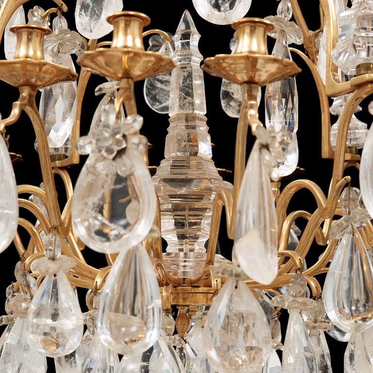 A late Baroque-style rock crystal twelve-light chandelier, circa 1900.