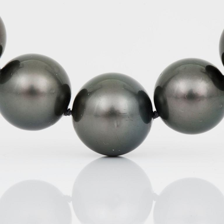 A cultured Tahiti pearl and brilliant-cut diamond necklace.