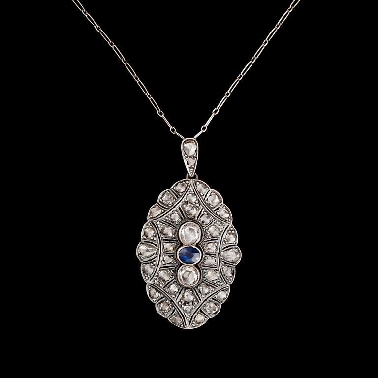 HÄNGE, platina och guld, fasettslipad safir ca 0,85 ct med rosenslipade diamanter totalt ca 4,50 ct. Vikt 14 g.