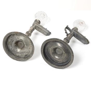 Oillamps, two similar, 19th century.