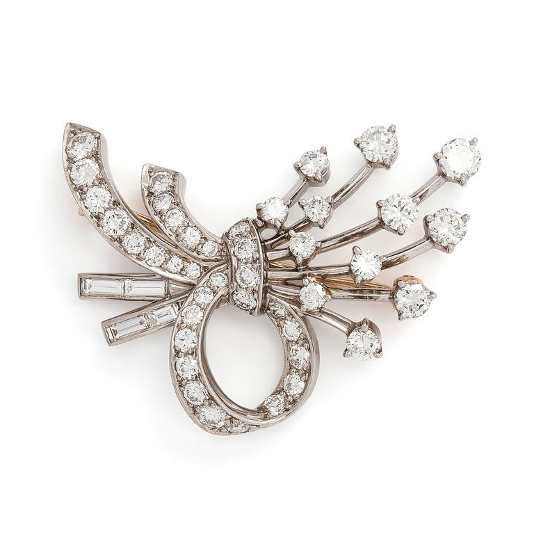 Tiffany & Co, A palladium brooch with brilliant- and baguette cut diamonds.