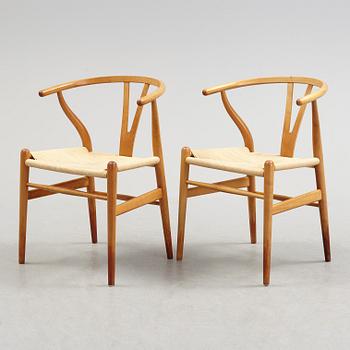 A set of four + two armchairs 'Y-chair' by Hans J Wegner, Carl Hansen & Son, Denmark.