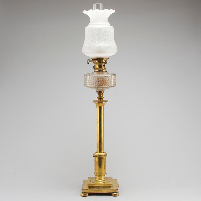 A brass oil lamp, late 19th Century.