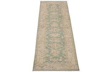 An Ushak runner carpet, c. 293 x 83 cm.