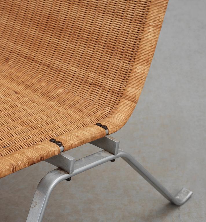 A Poul Kjaerholm steel and ratten 'PK-22' easy chair, E Kold Christensen, maker's mark in the steel.