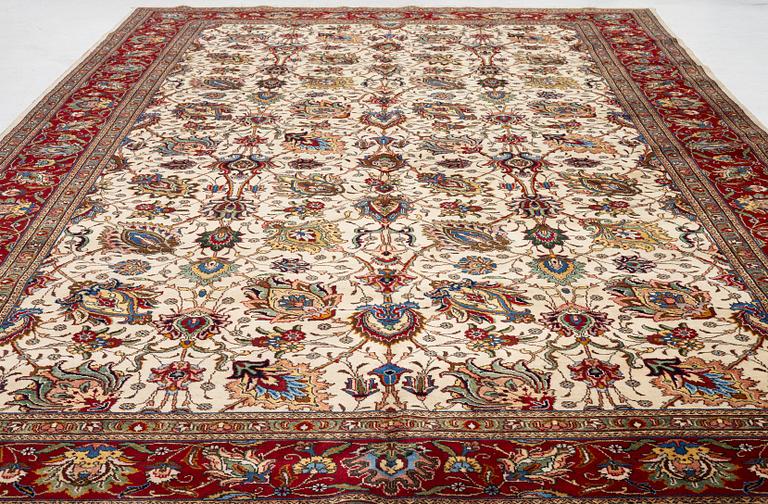 A Tabriz carpet, Northwestern Iran, of Safavid 'palmette' design, c, 483 x 302 cm.