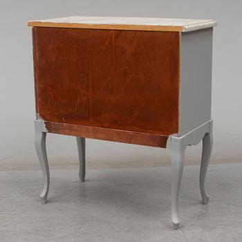A Rococo style chest of drawers, second half of the 20th century.