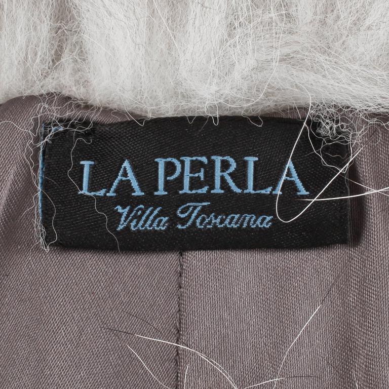 LA PERLA, a fox fur shawl.