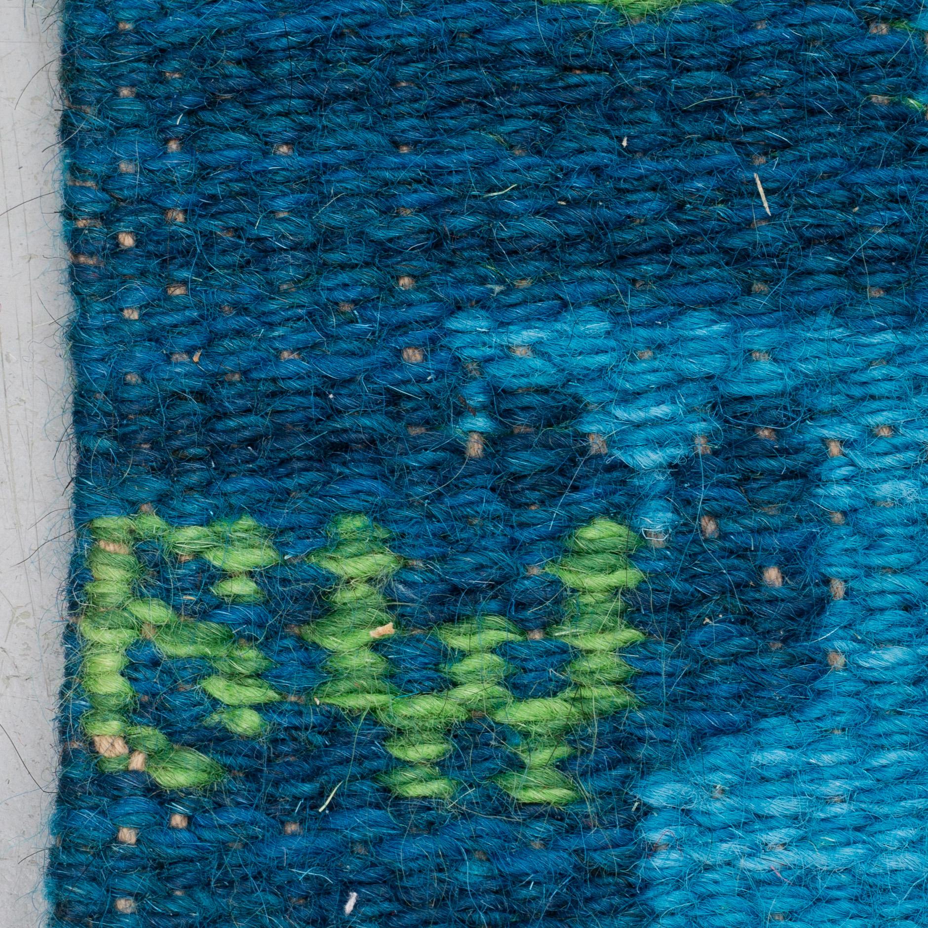 BERIT WOELFER, A CARPET, double-sided machine made, ca 198-200,5 x 132,5 cm, signed BW.