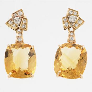 Faceted citrines and diamond earrings.