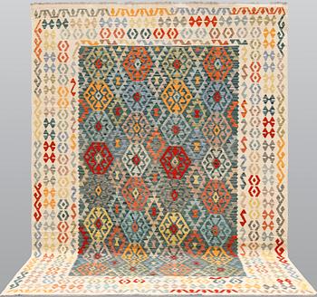 A Kelim carpet, c. 354 x 250 cm.