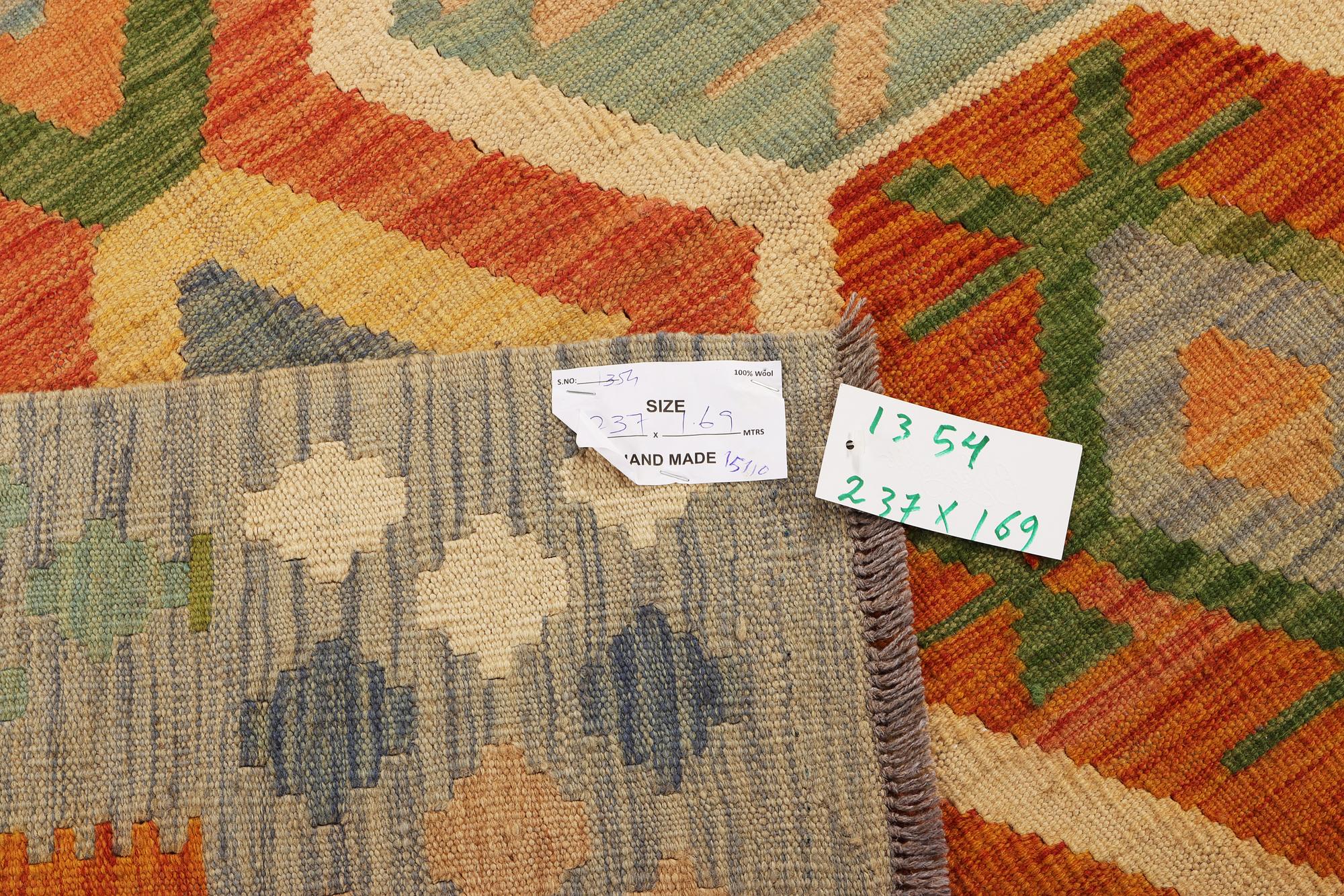 An Afghan kelim carpet, c. 237 x 169 cm.