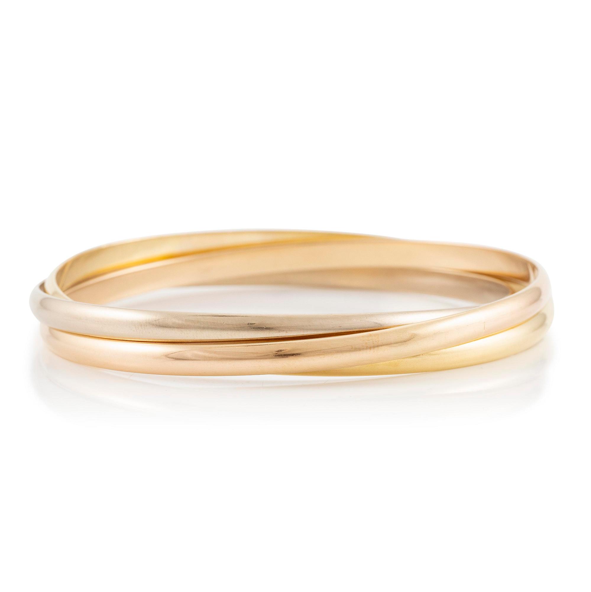 A Cartier bracelet "Trinity" 18K gold in three colours.