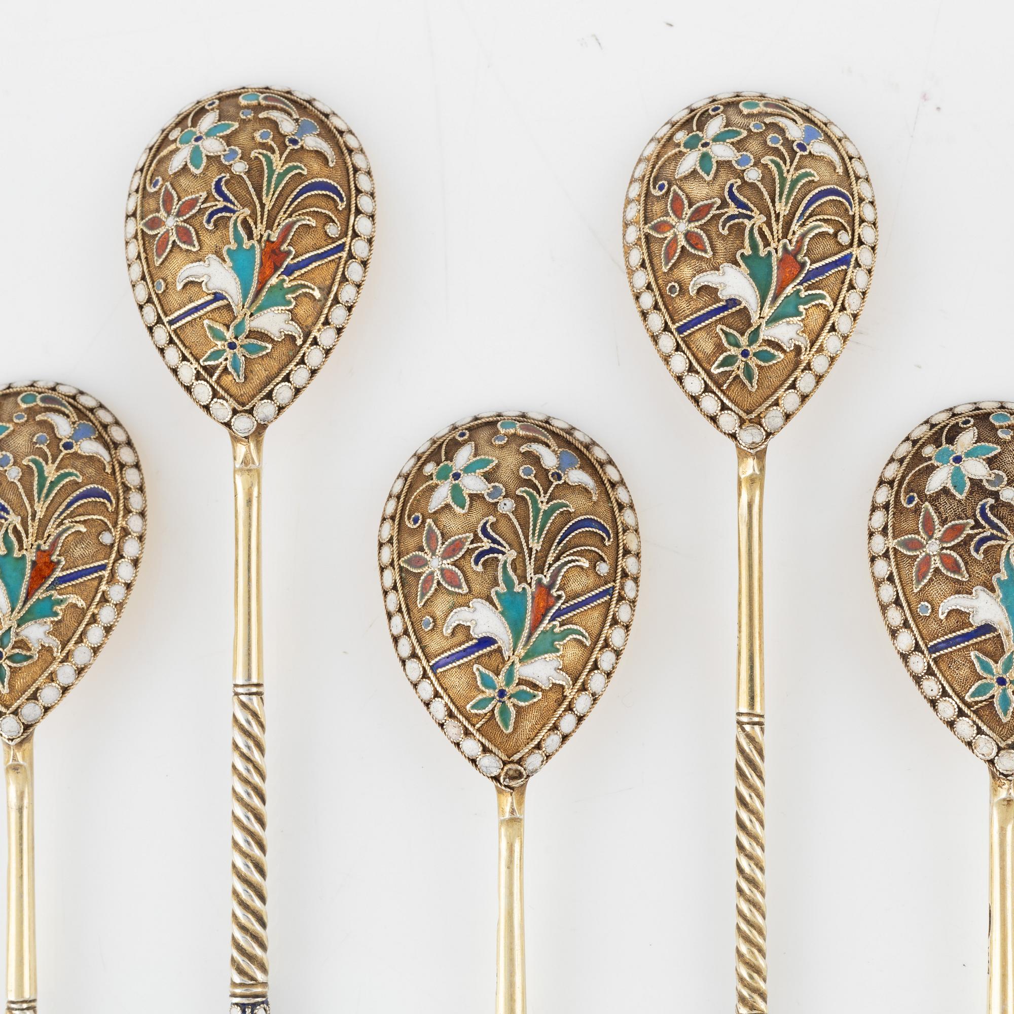 Eight Russian gilded silver and enamel spoons, Moscow, 1896-1908.