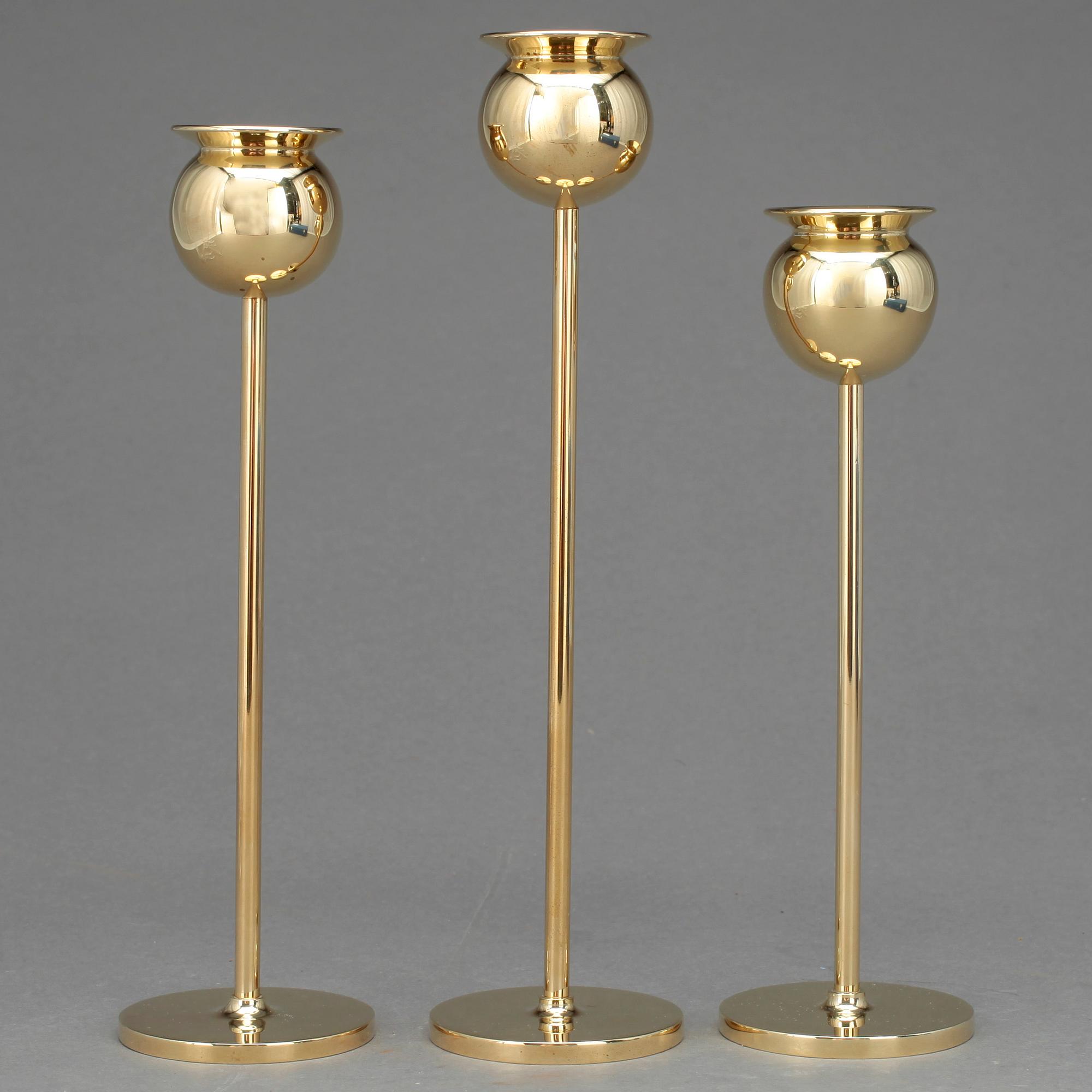 LJUSSTAKAR, 3 st, mässing. Pierre Forsell, Skultuna.