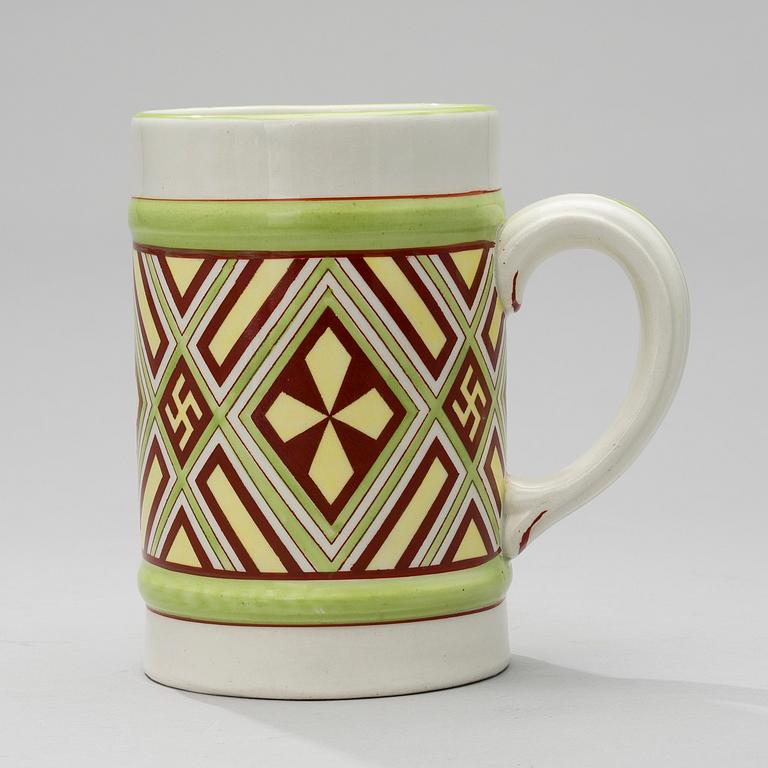 A MUG. Fennia series. The designers Jac. Ahrenberg och Thure Öberg.