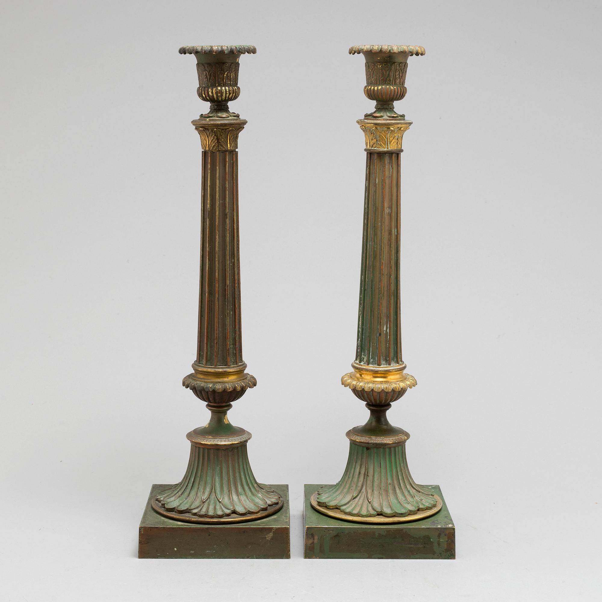 A pair of bronze gustavian candlesticks, late 18th century.