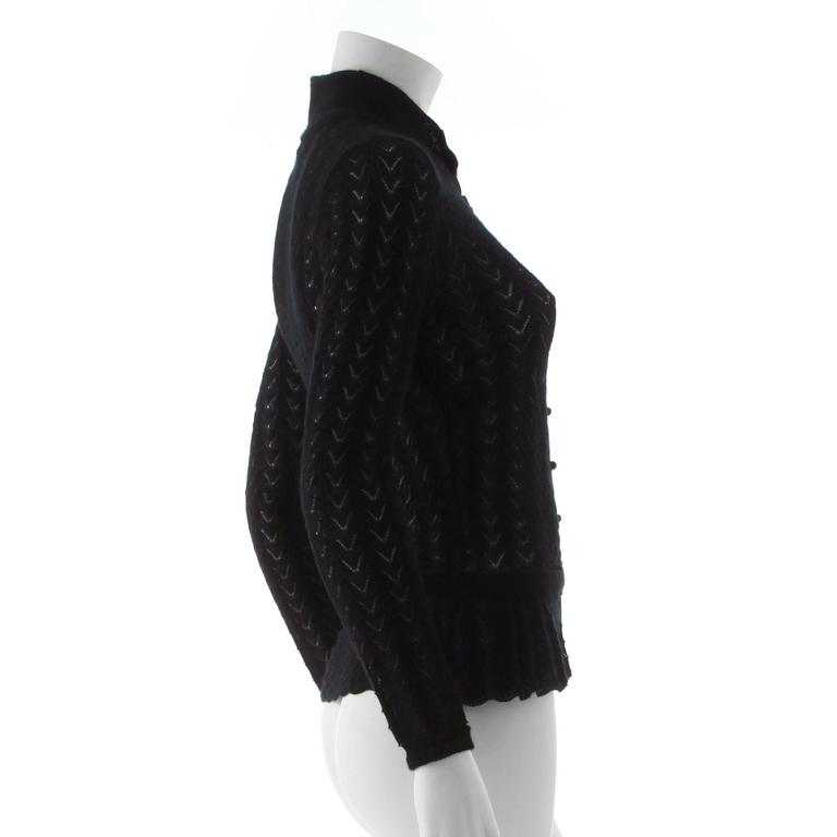 LOUIS VUITTON, a black cashmere cardigan.