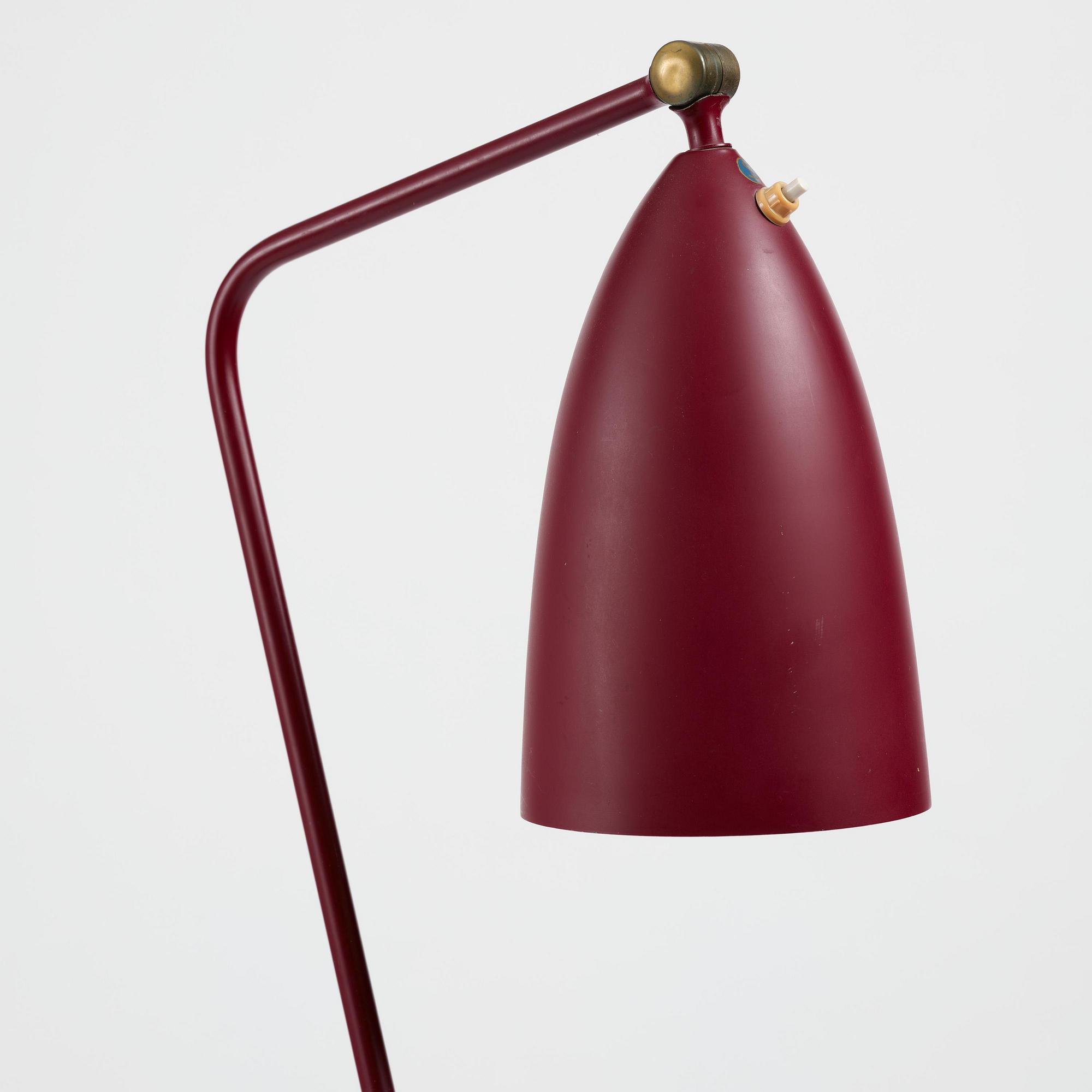 Greta Magnusson Grossman, a burgundy red "Grasshopper" floor lamp model "G-33", Bergboms, Malmö, 1950s.