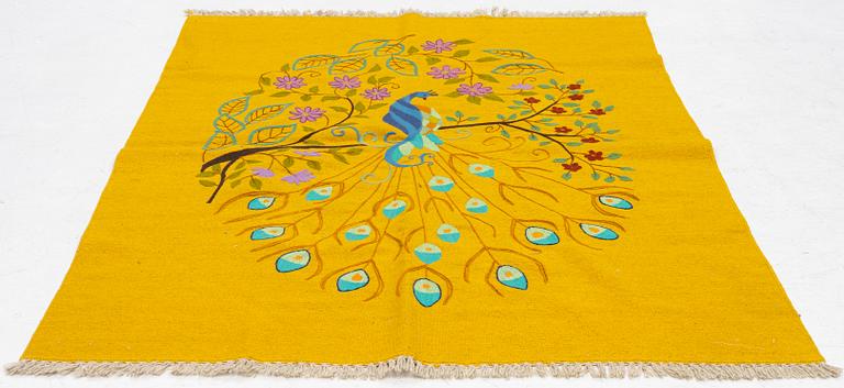 A hand-embroidered kilim rug, c. 200 x 156 cm.