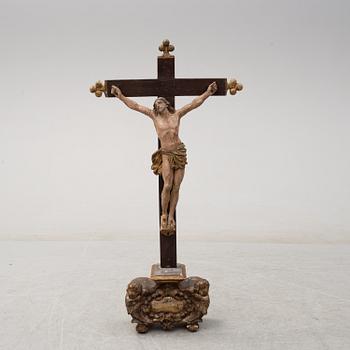 A 17TH CENTURY WOODEN CRUCIFIX, baroque.