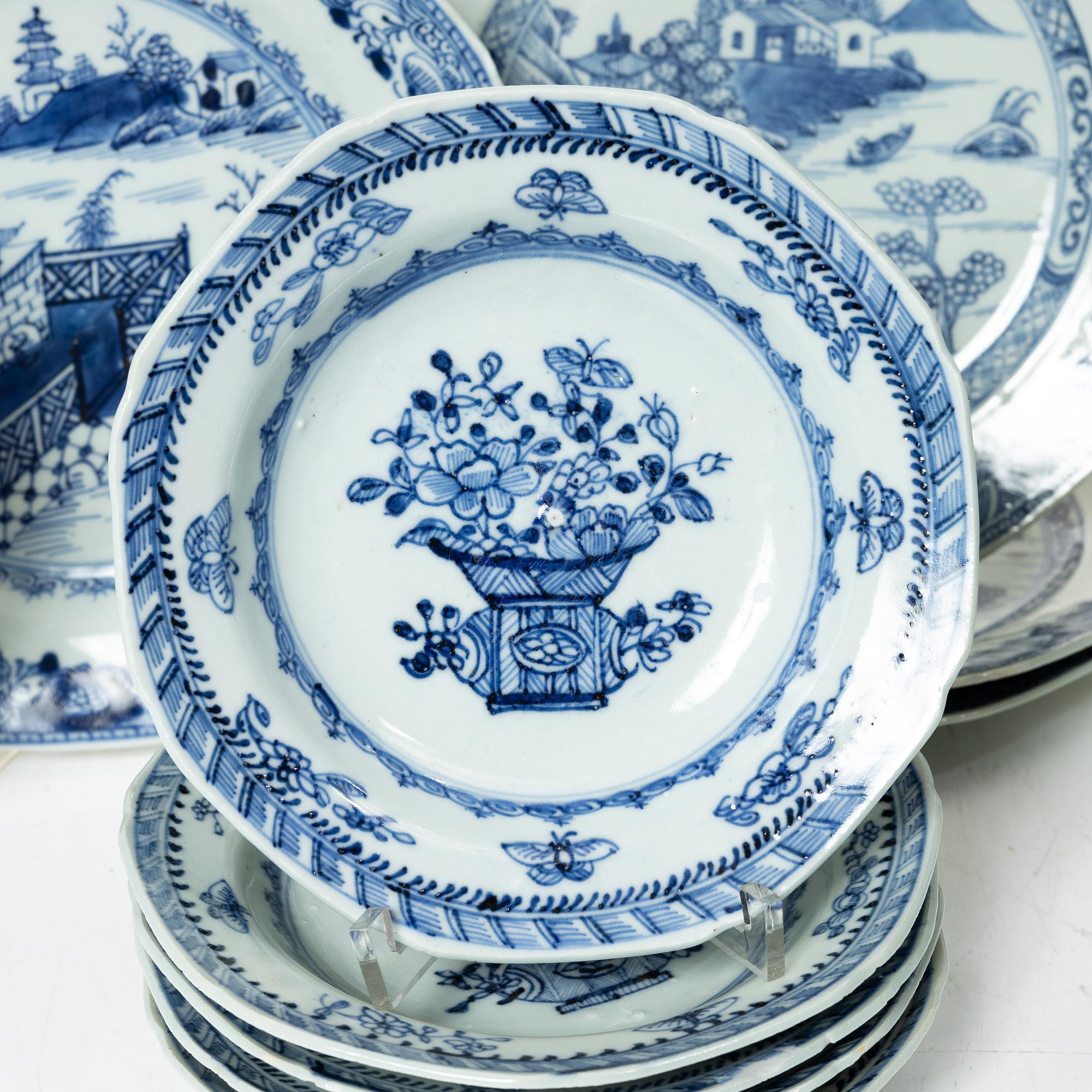 A group of seven Chinese blue and white porcelain plates and five dessert dishes, Qing dynasty, Qianlong (1736-95).