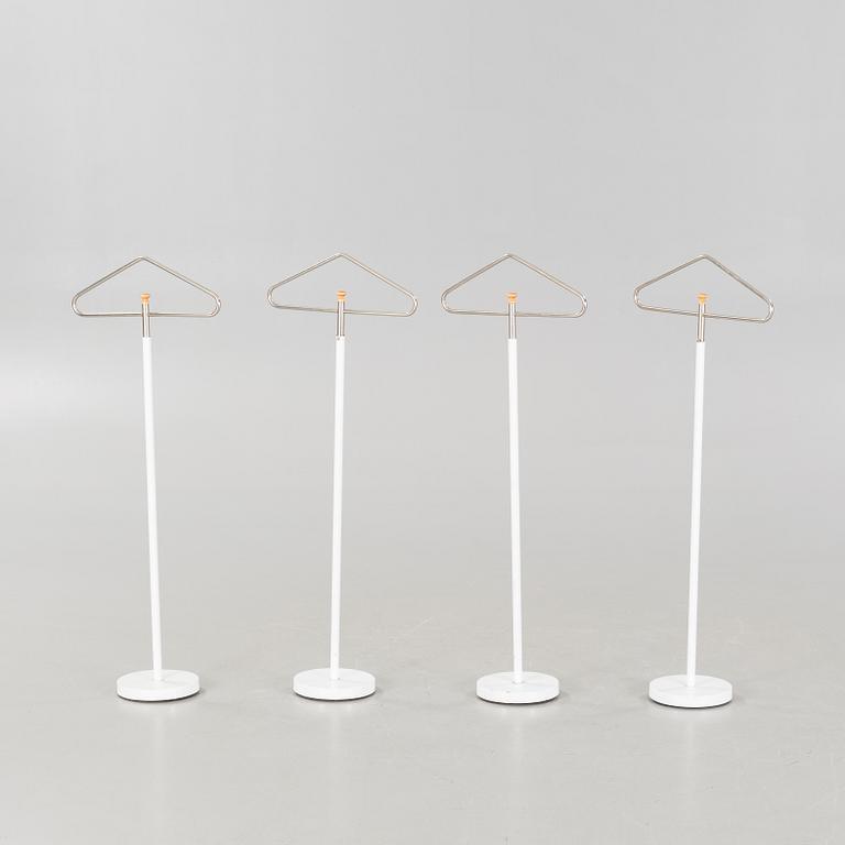 Four coat-hangers from the second half of the 20th century.