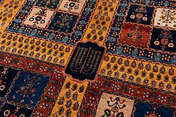 An oriental 'garden' carpet of Safavid design probably from the Shiraz area, Iran, c 343 x 254 cm.