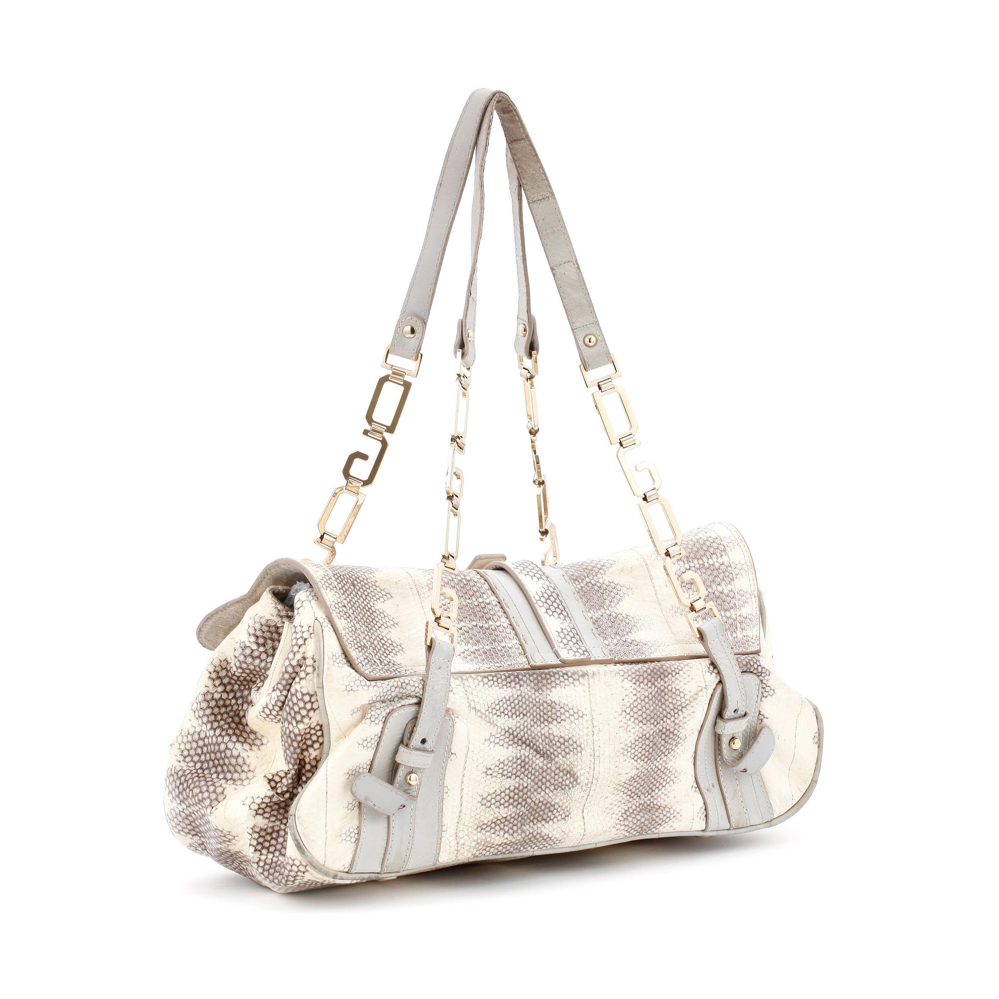 HANDVÄSKA samt SKOR, ett par. Storlek 39.