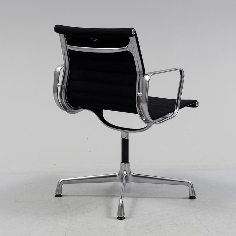 A 'EA 104 Swivel' armchair by Charles & Ray Eames, Vitra, 2016.