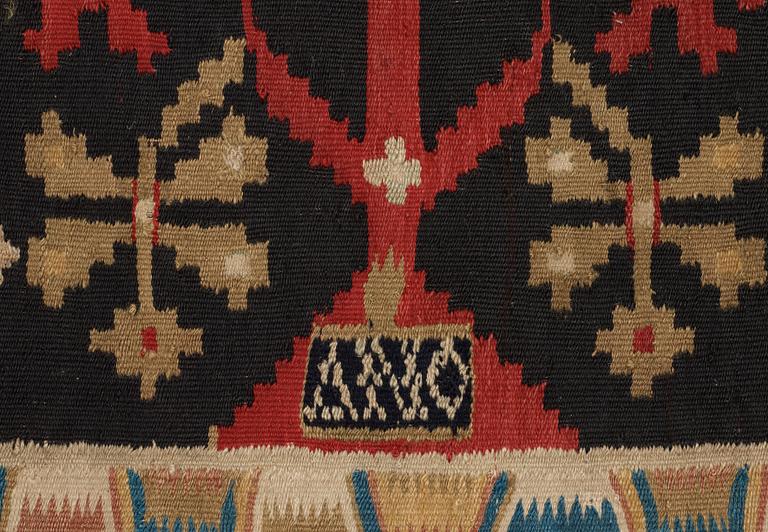 CARRIAGE CUSHION. Rölakan (flat weave). 51,5 x 114 cm. Skåne, Skytts härad (district), dated 1819.