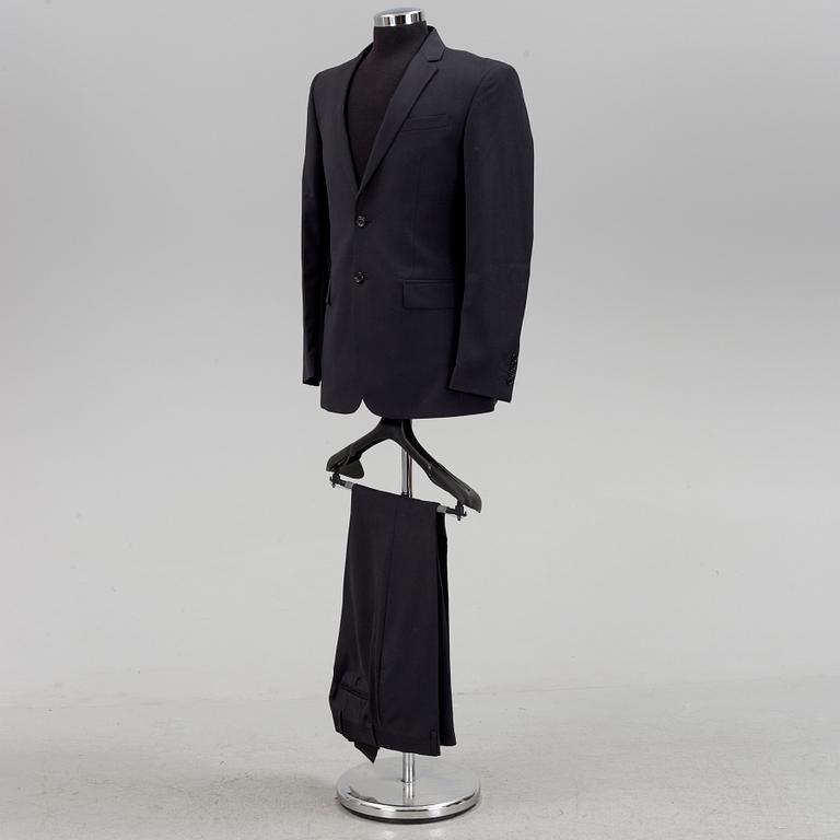 A suit by burberry, in size 48R.