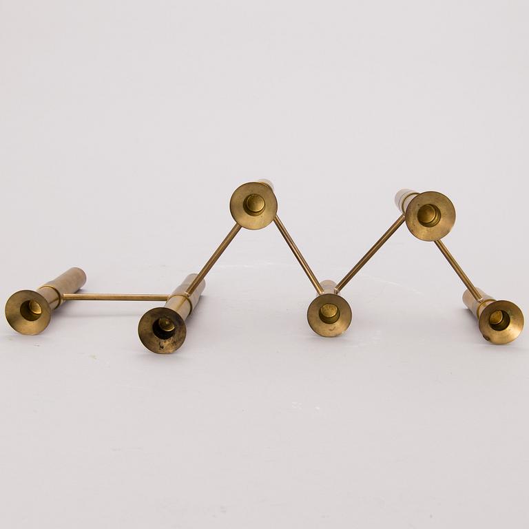 A 1970s 'Nonstop' brass serial candelabra by Hopeakeskus, Finland.