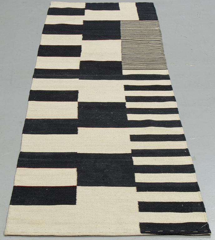 A runner, an Oriental kilim, ca 283 x 80,5-83 cm.