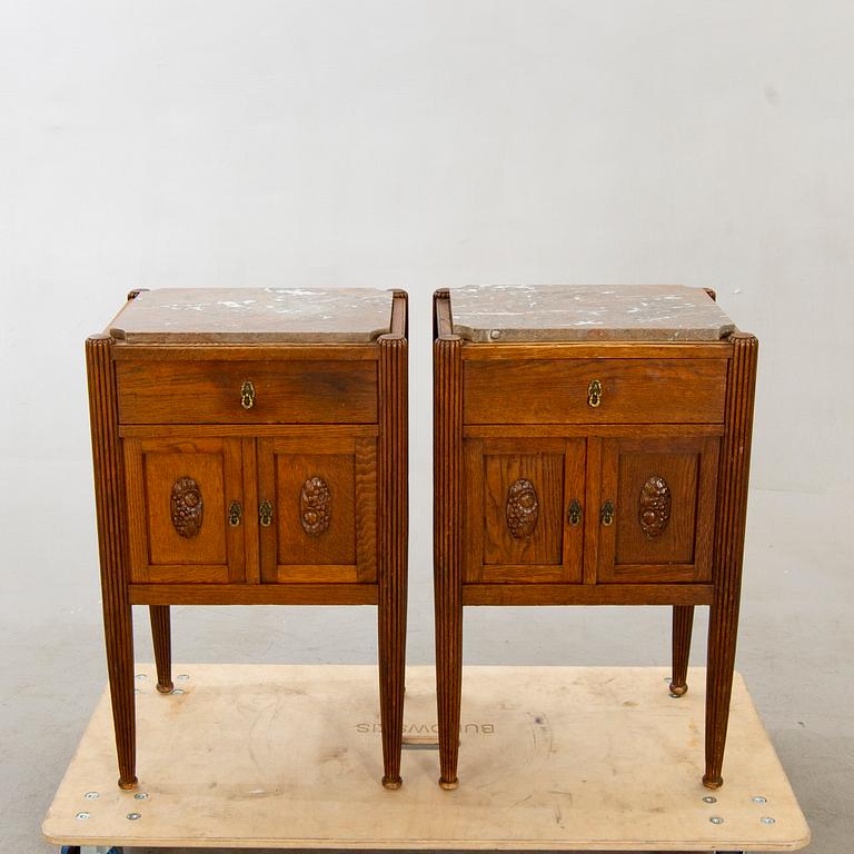 A pair of oak bedside tables beginning of the 20th century.