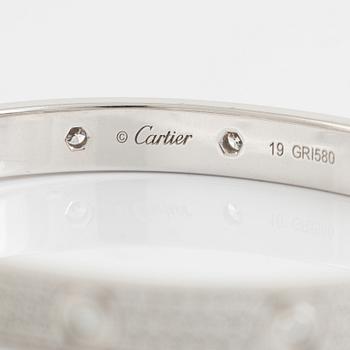A Cartier "Love Pavé" in 18K white gold set with round brilliant-cut diamonds.