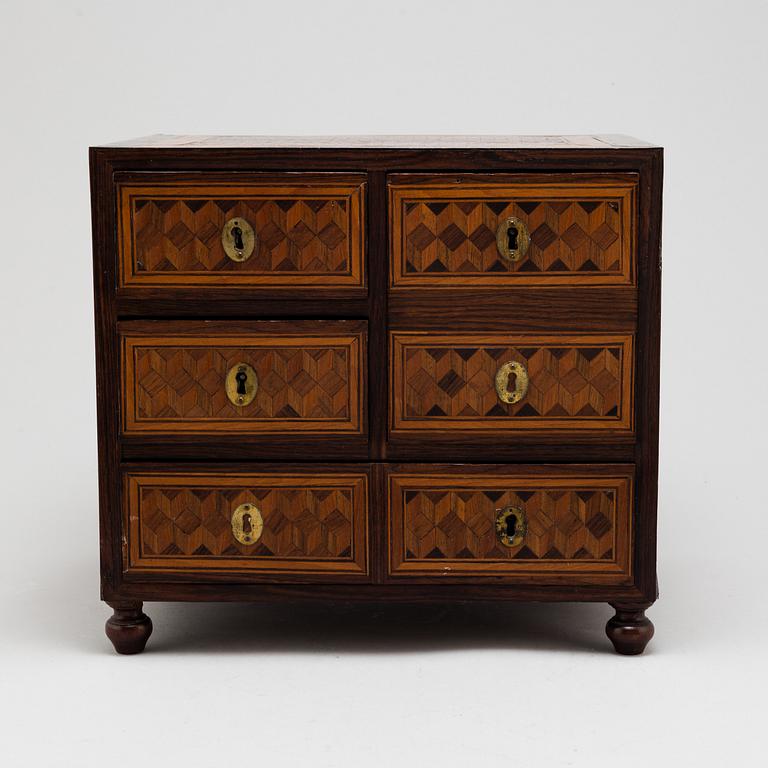 A 19th century chest of drawers.