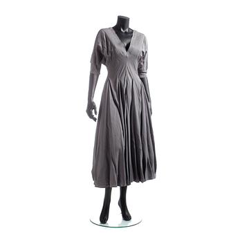 ALAÏA, a grey dress.