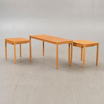 A 1960s oak nesting table.