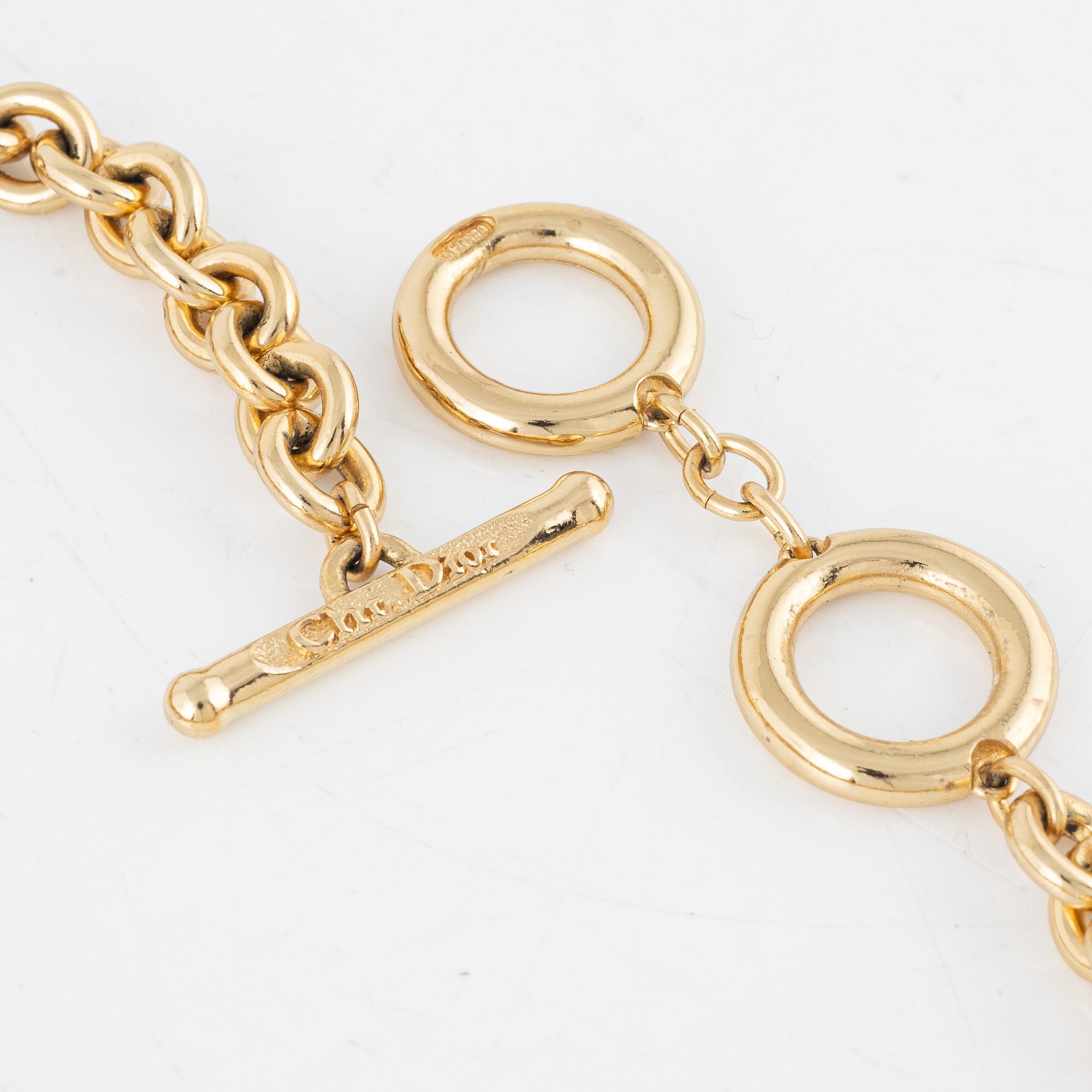 Christian Dior, necklace and pin.