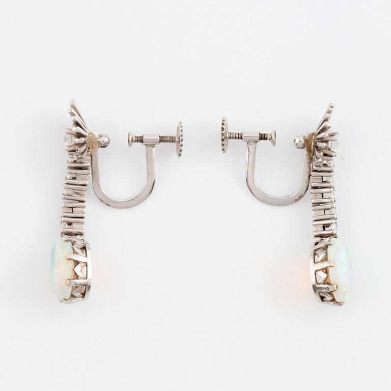 Opal and round brilliant cut diamond earrings.