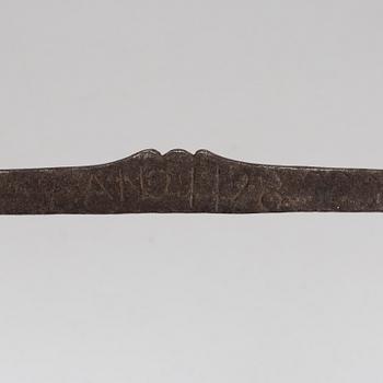 A 18th century hacksaw dated 1728.