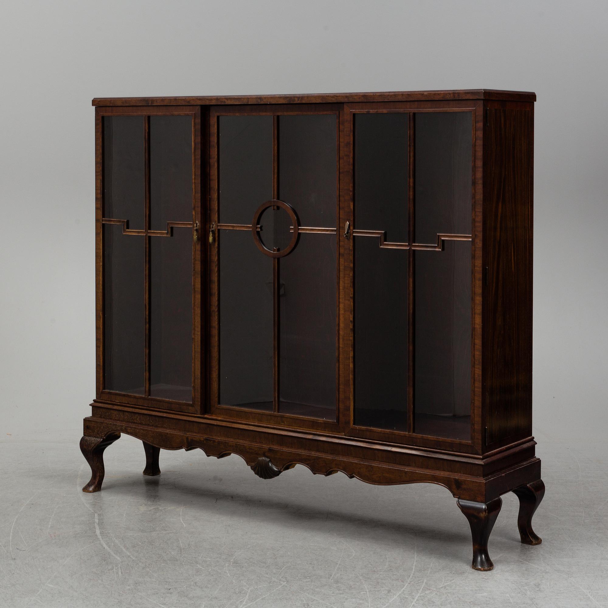 A 1920's/30's vitrine cabinet.