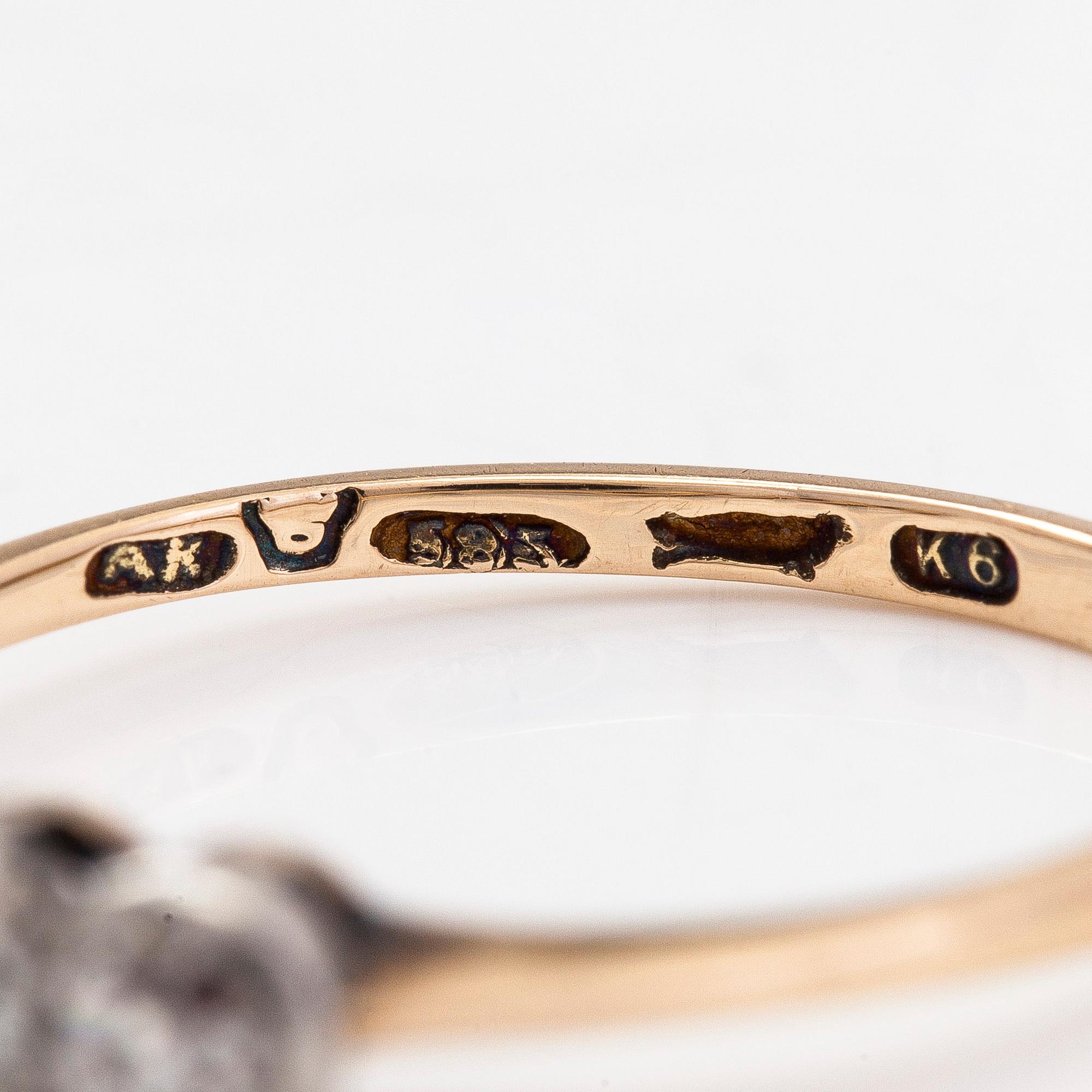 A 14K gold ring, with old-cut diamonds totalling approximately 0.32 ct, A.Koistinen, Helsinki 1939.